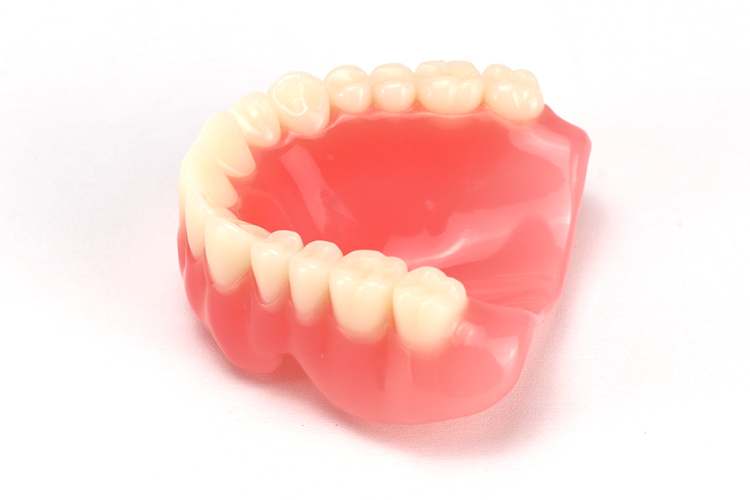 3D printed denture base with finished denture teeth